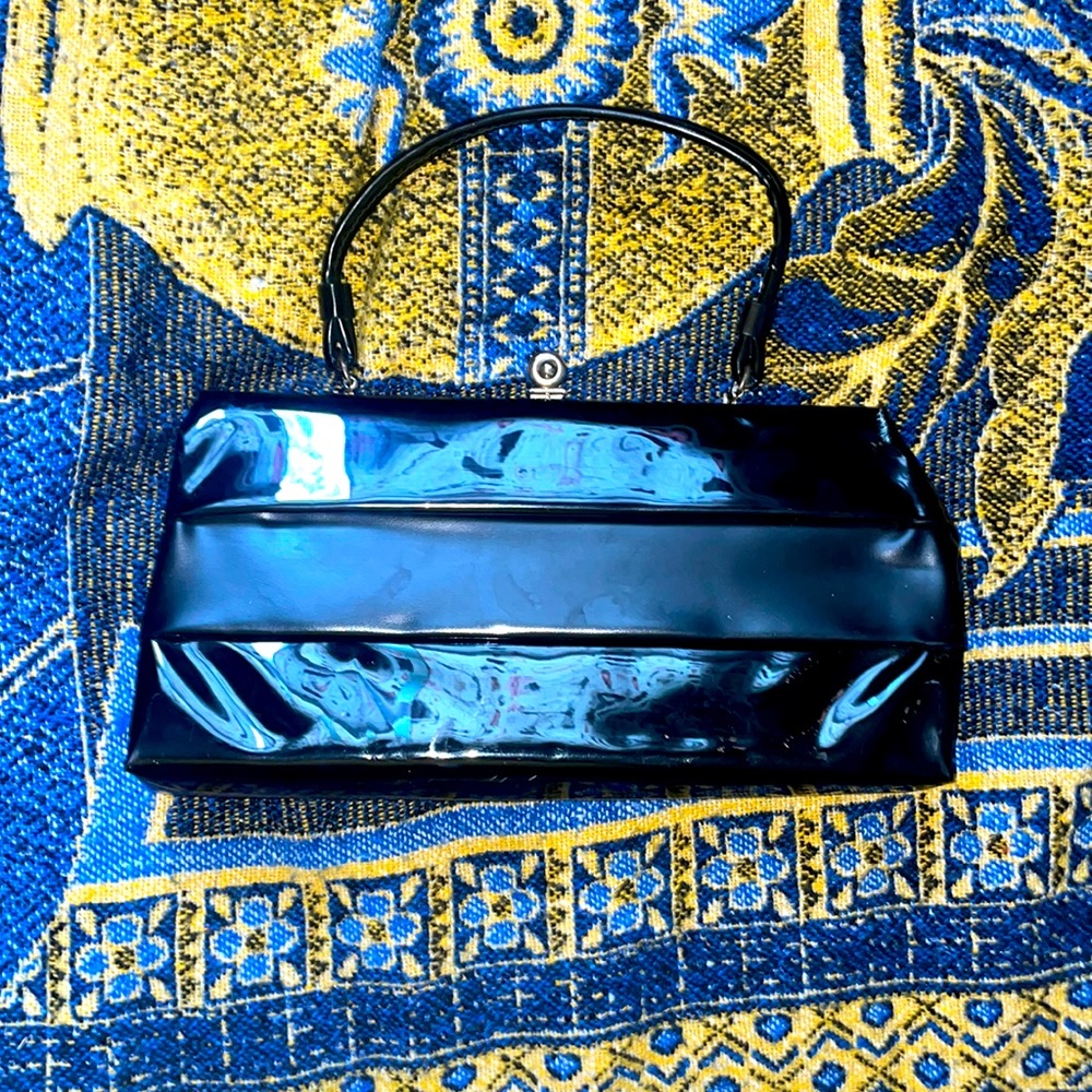 Black vinyl hand bag